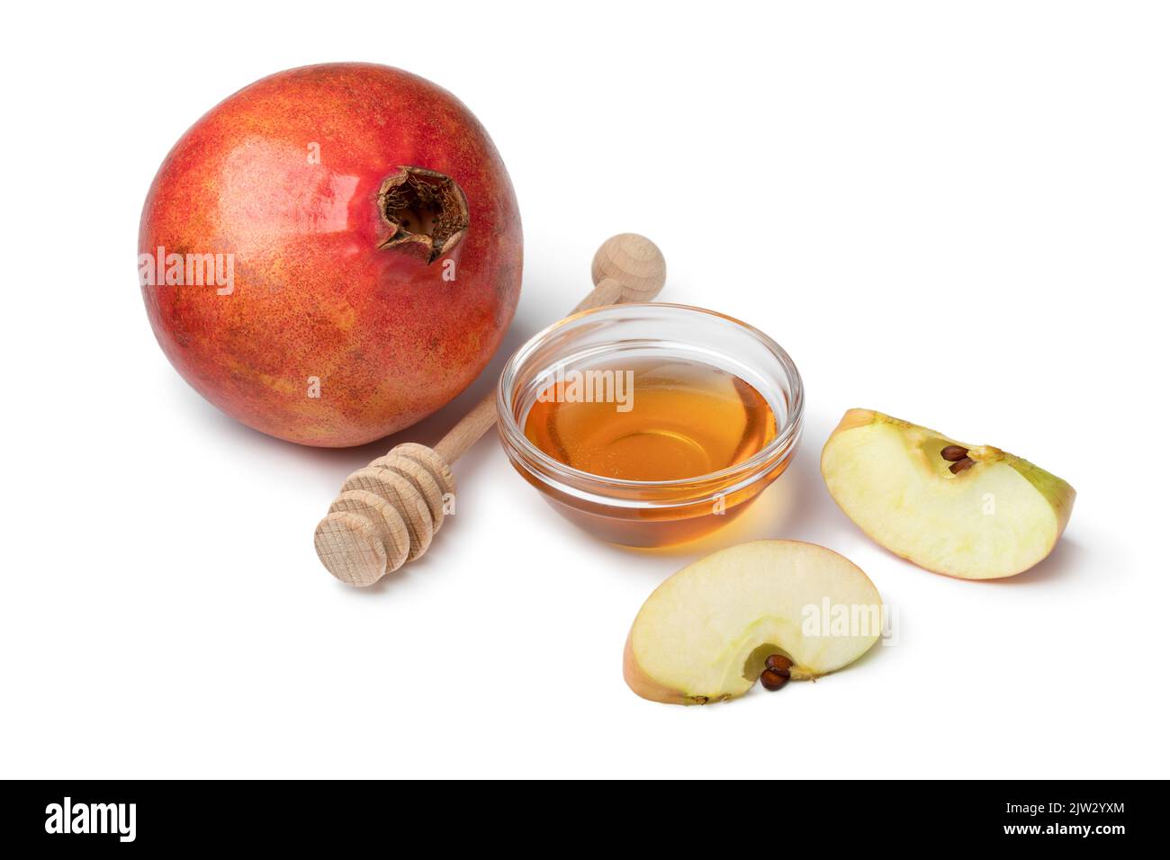 Apfel, Granatapfel und Honig für Rosh Hashanah, jüdisches Neujahr, isoliert auf weißem Hintergrund aus nächster Nähe Stockfoto