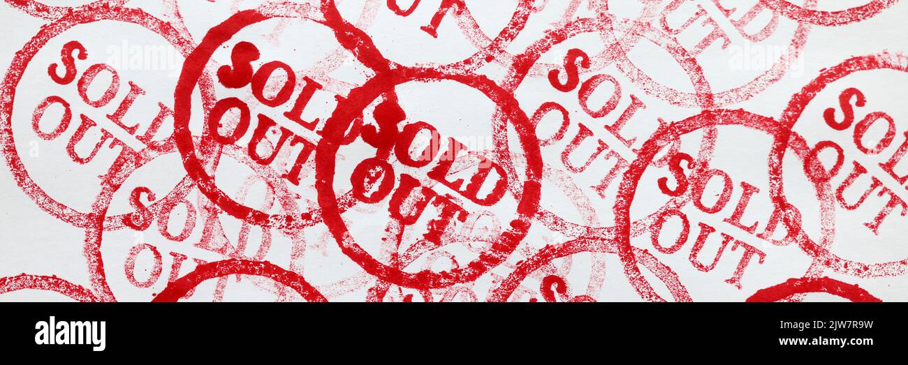 Viele rote Marken ausverkauft auf Papier Nahaufnahme Hintergrund Stockfoto