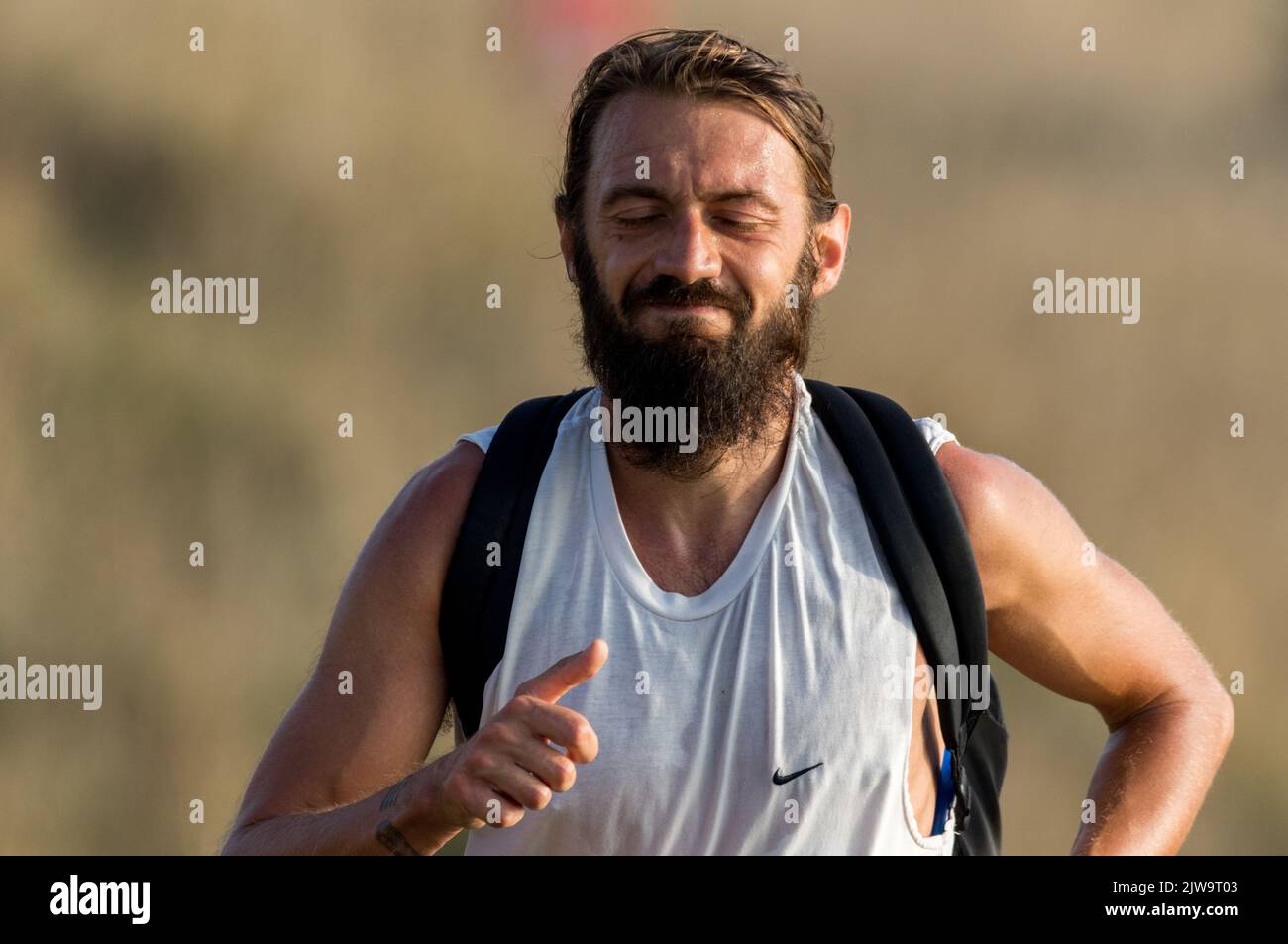 Läufer und Wanderer starten die South Coast Challenge bei für ihre ausgewählten Wohltätigkeitsorganisationen. Jeder Teilnehmer muss entweder eine 100km, 57km, 43km absolvieren. Stockfoto