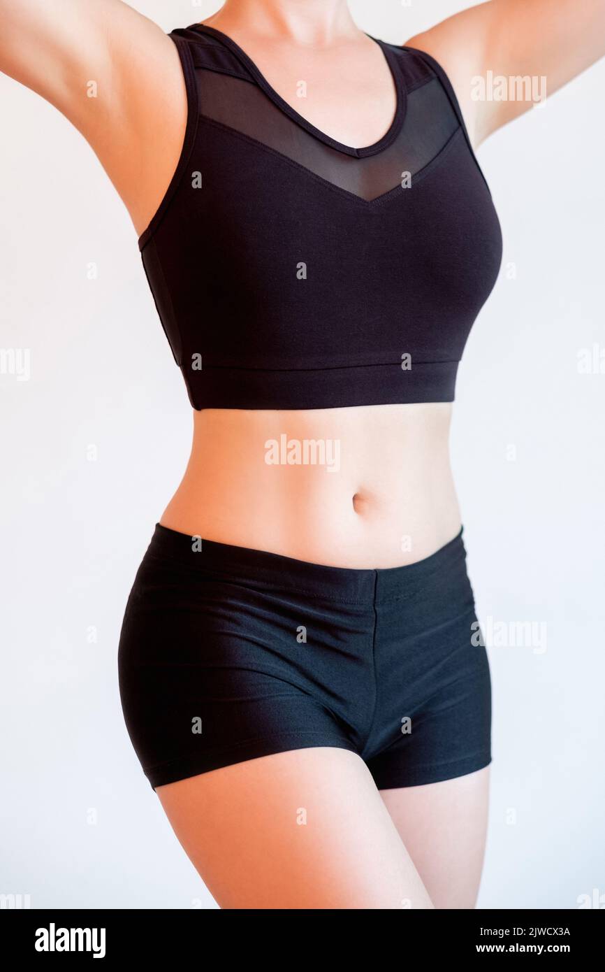 Sport Lifestyle gesunde Ernährung Frau schlanken Körper Taille Stockfoto