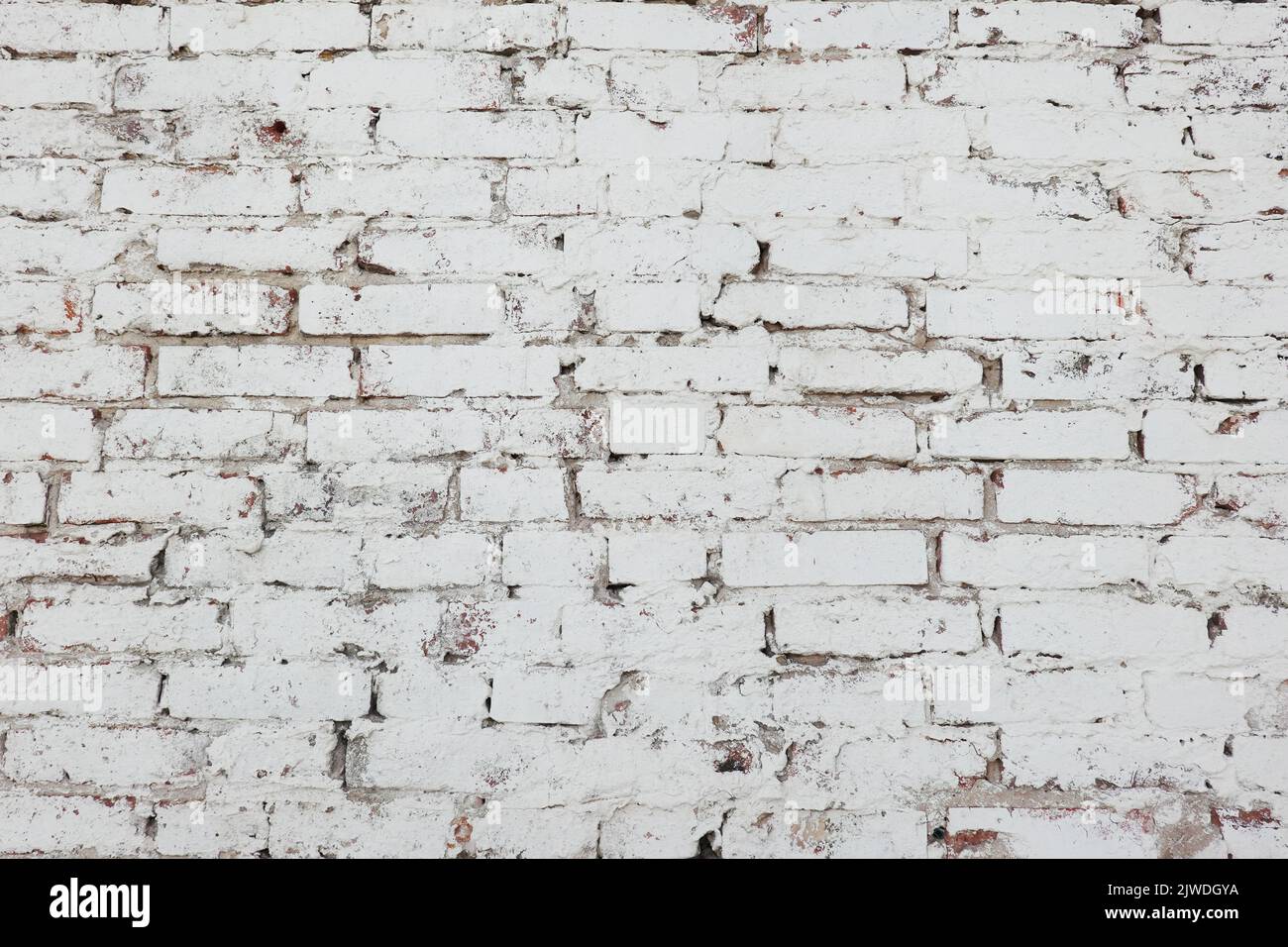 Alte Backsteinmauer weiß Farbe grunge Hintergrund Stockfoto