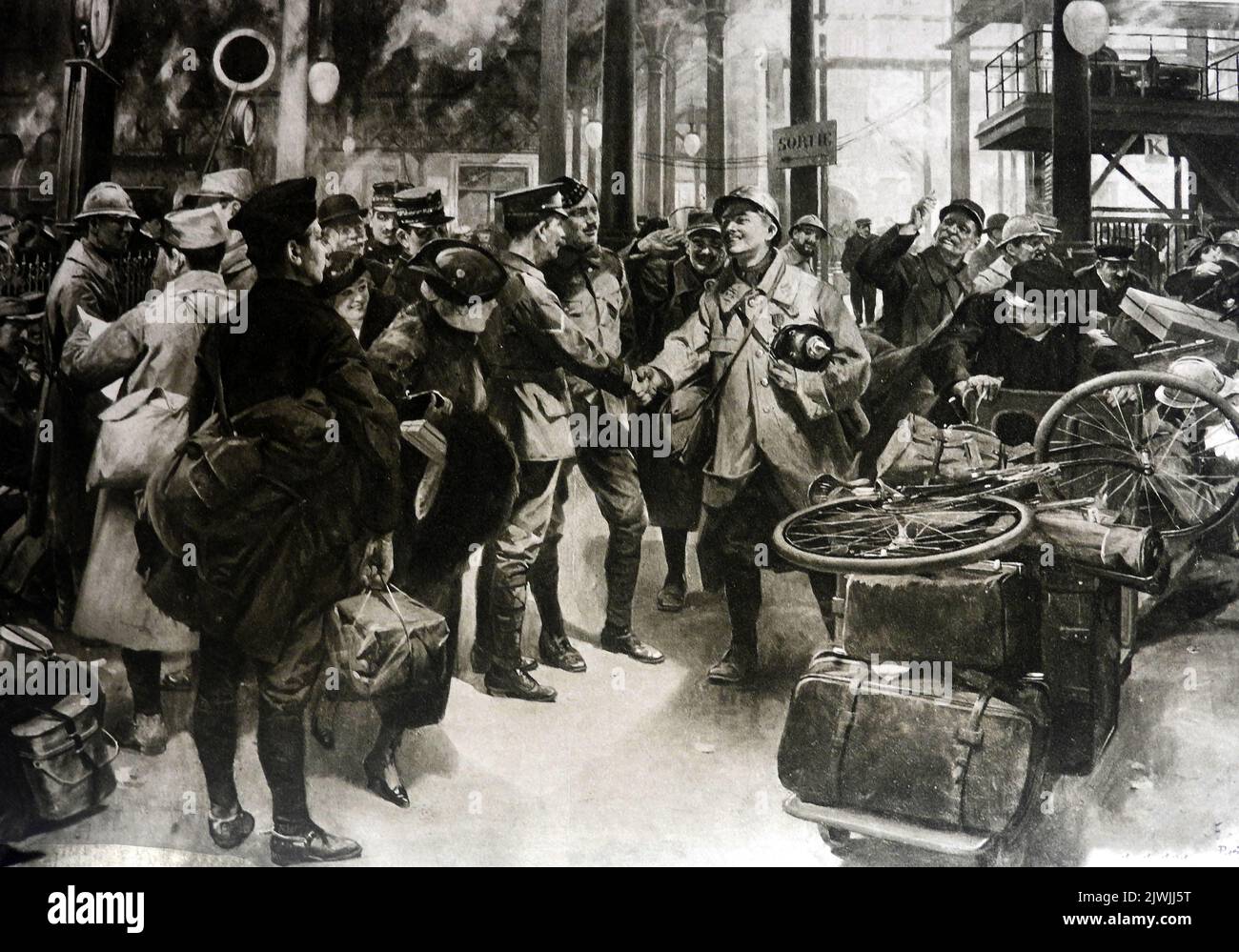 1. Weltkrieg - Französische Truppen begrüßen britische Soldaten, die gerade an einem französischen Bahnhof angekommen sind. Stockfoto