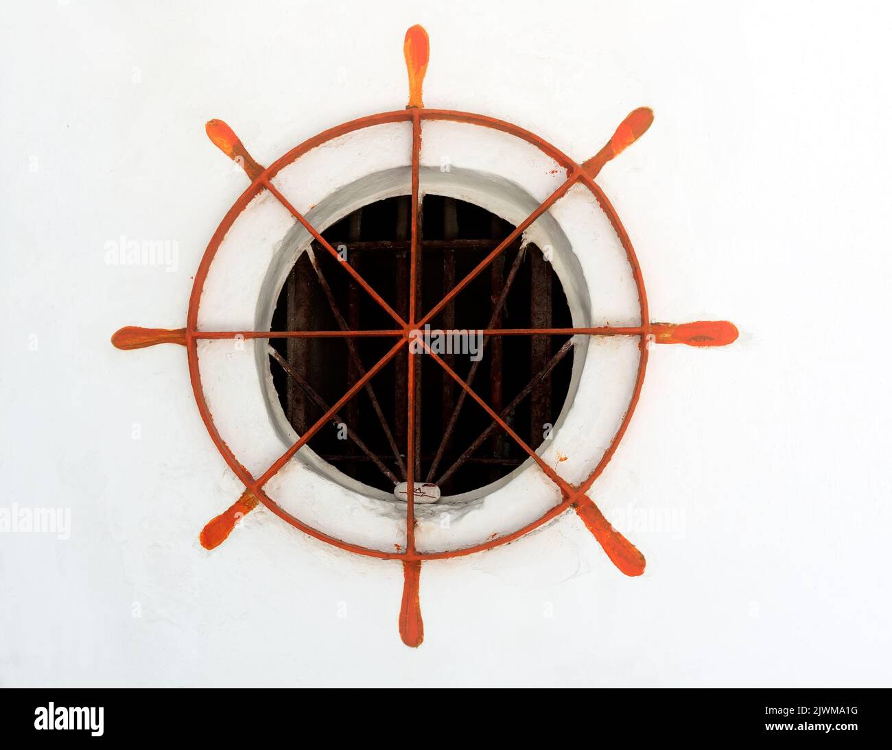 Radgitter an einer Wand Stockfoto