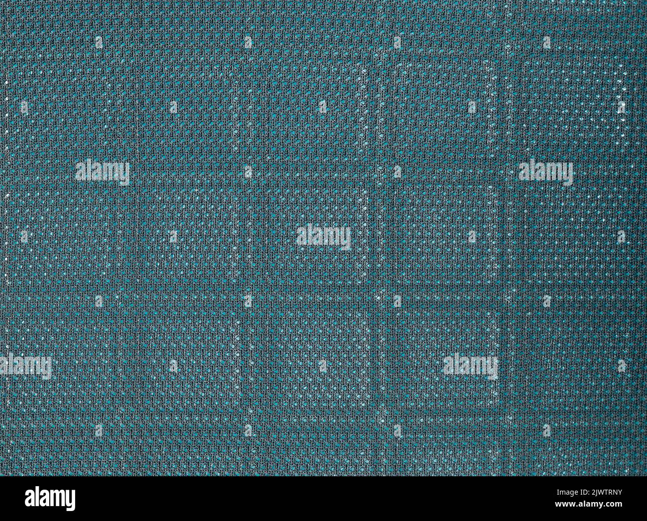 Blauer abstrakter Hintergrund mit Grilllöchern in Nahaufnahme Stockfoto