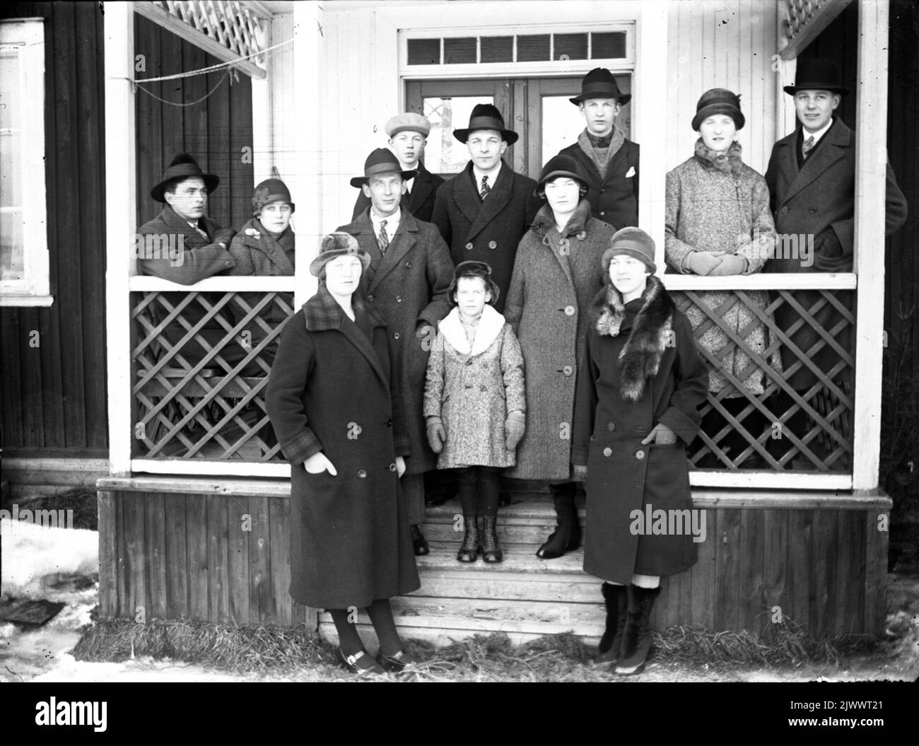 Gruppenbild, auf der Veranda. Gruppenbild, på Veranda. Stockfoto