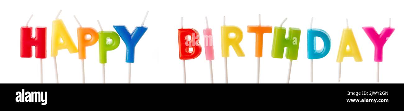 Worte Happy Birthday aus Jubiläumskerzen auf weißem Hintergrund isoliert Stockfoto