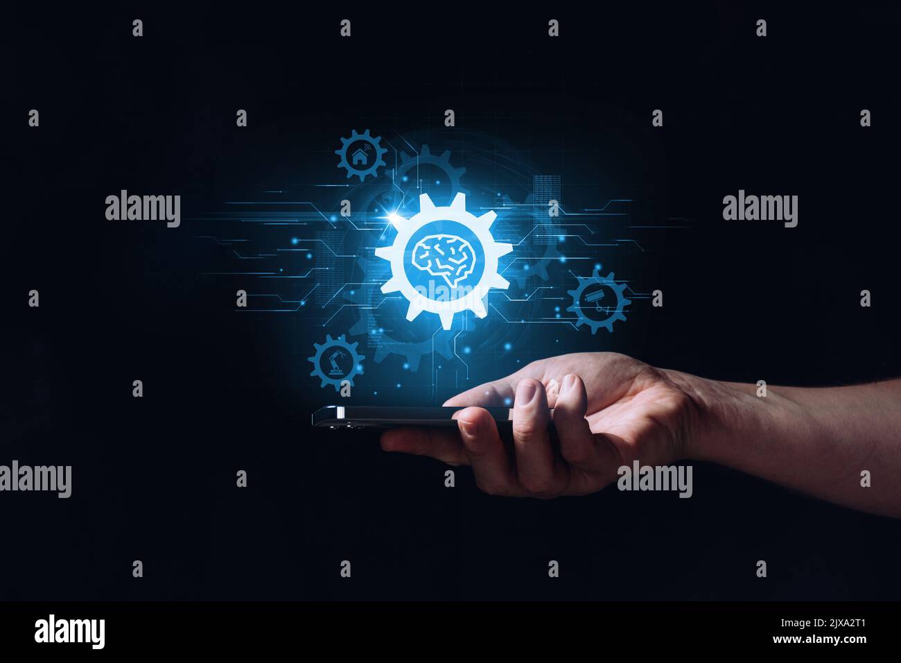Konzept künstliche Intelligenz oder ai. Hologramm mit Gehirnsymbol über der Hand Stockfoto