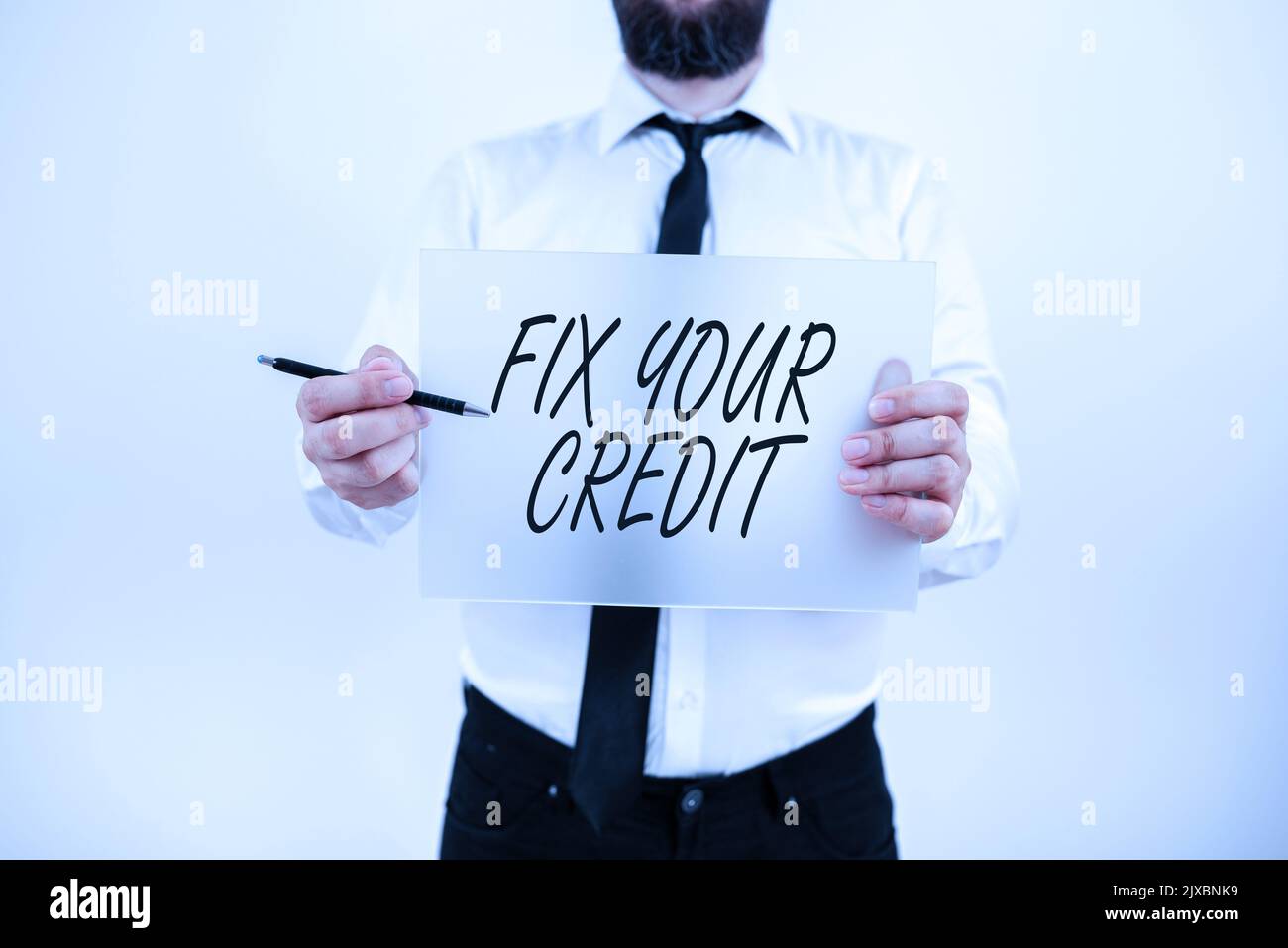Textschild zeigt Fix your CreditKeep balances low on credit cards and other credit an. Überblick über das Unternehmen Halten Sie Guthaben bei Kreditkarten und anderen Karten niedrig Stockfoto
