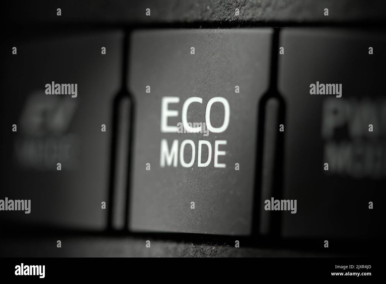 Eco-Modus-Taste an Einem Toyota Auris Hybrid-Motorfahrzeug, Auto, Großbritannien Stockfoto