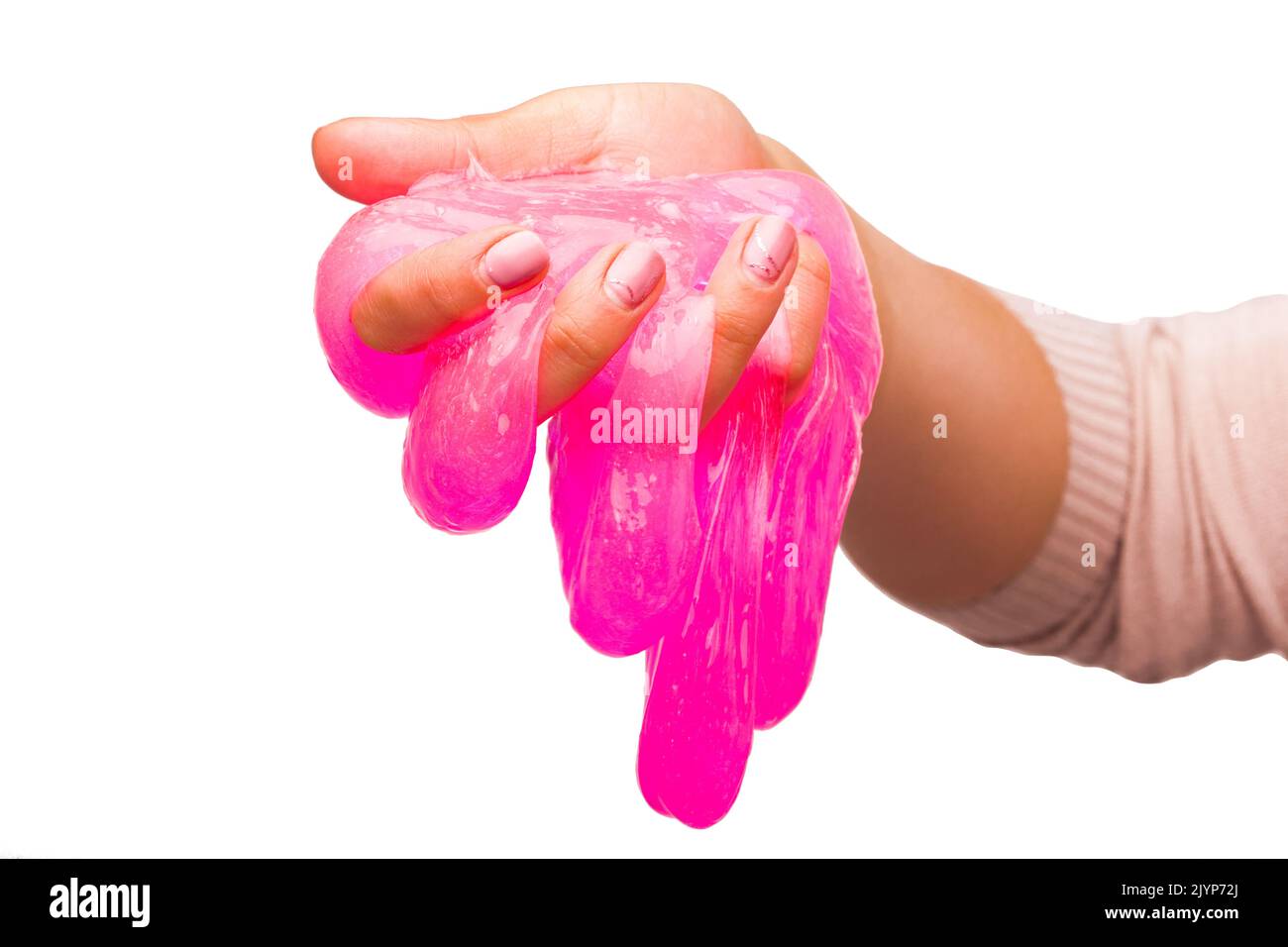 Ein Spielzeug für Kinder Schleim und Flüssigkeit fließt auf einem weißen Hintergrund auf der Hand Stockfoto