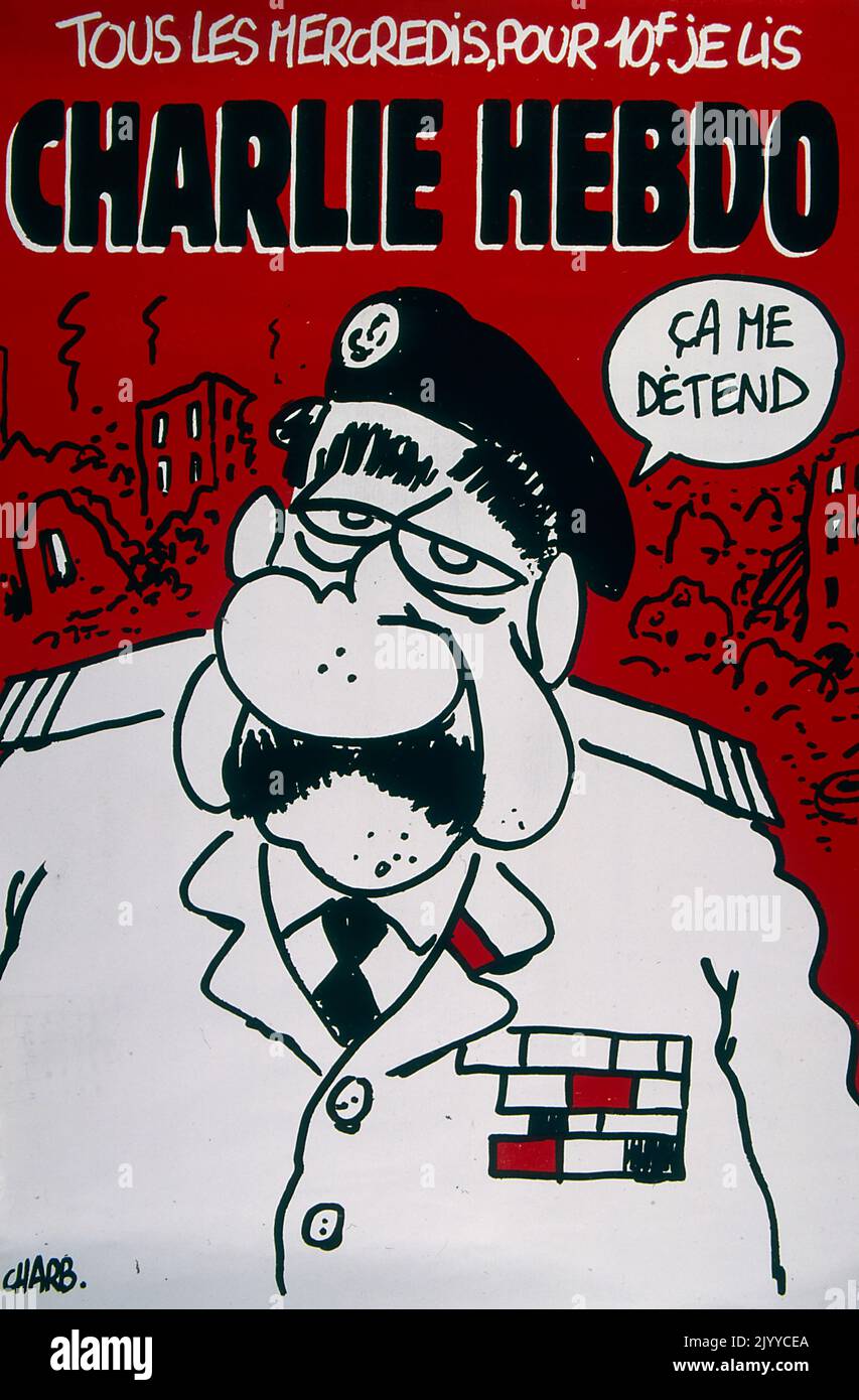 Farbiger Fronteinband des satirischen Magazins Charlie Hebdo. Zeigt einen alten Mann (möglicherweise Saddam Hussein), der sagt: „Das entspannt mich“. Im Hintergrund ist eine Stadt zerstört. Stockfoto