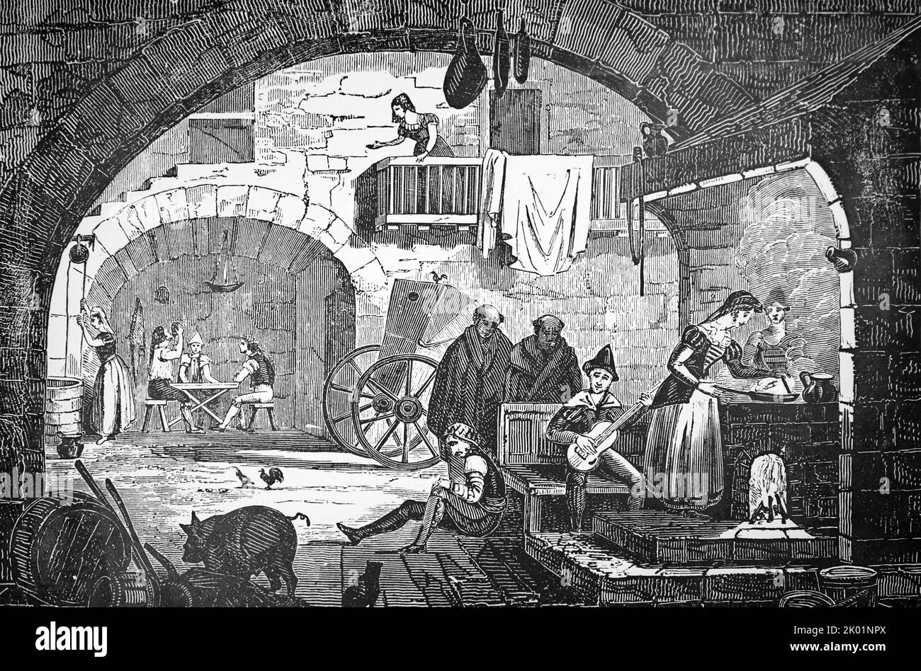 Innenhof eines spanischen Gasthauses, wo das Essen in einer Pfanne gekocht wird. Stockfoto