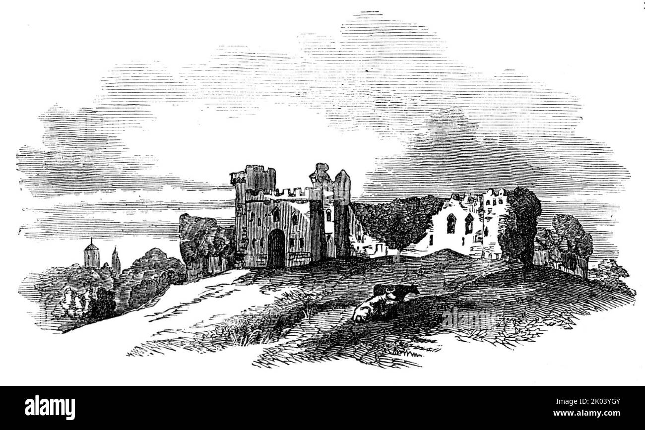 Überreste von Schloss Caldicott, 1854. Ausflug der British Archaeological Association zum Caldicot Castle in Wales. „Herr Freeman war der Ansicht, dass der älteste Teil des Gebäudes einige Reste eines Kamins in der inneren Halle war, die frühenglisch waren. Er konnte nichts Normannisches darin finden... als er das Schloss betrat, kam ein Sturm auf, und die Archäologen mussten sich in den Türmen und Nischen selbst abschirmen. In einem dieser Gebäude befand sich ein rustikales Viertel voller traditioneller Überlieferungen, das der Gesellschaft versicherte, dass der Turm, in dem sie errichtet und von Julias Caesar bewohnt wurden, Stockfoto