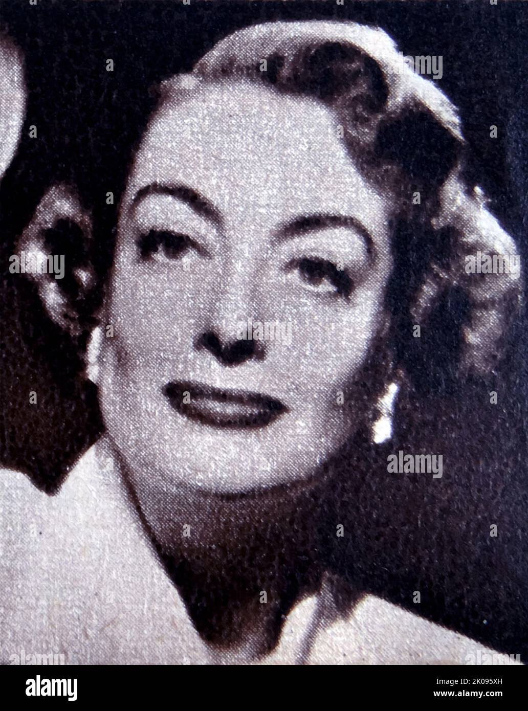 Joan Crawford (geboren Lucille Fay Lesueur; März 23, c.. 1904-1908 - 10. Mai 1977) war eine amerikanische Schauspielerin. Crawford begann als Tänzerin in Reisenden Theaterkreisen, bevor er am Broadway debütierte und wurde 1925 von Metro-Goldwyn-Mayer zu einem Filmvertrag unterzeichnet. Stockfoto
