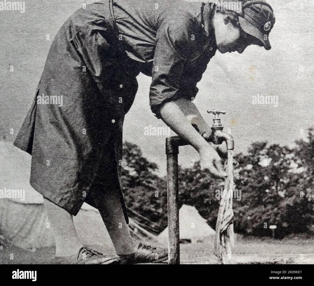 Frauen im Frauentransport-Servicelager in Aldershot während des Zweiten Weltkriegs Der Hilfsterritorialdienst war während des Zweiten Weltkriegs die Frauenabteilung der britischen Armee. Es wurde am 9. September 1938 gegründet, zunächst als Freiwilligendienst für Frauen, und bestand bis zum 1. Februar 1949, als es in das Royal Women's Army Corps fusioniert wurde. Stockfoto