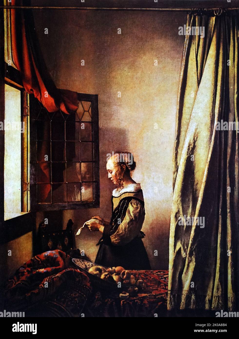 Gemälde des niederländischen Malers Jan Vermeer. Johannes Vermeer (Oktober 1632 - Dezember 1675) war ein niederländischer Barockmaler, der sich auf häusliche Innenräume des bürgerlichen Lebens spezialisierte Stockfoto
