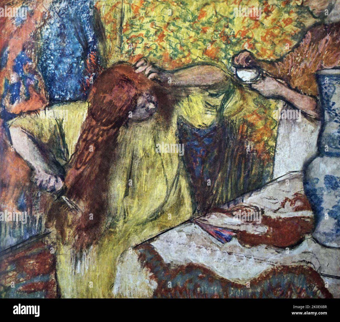 Frau an ihrer Toilette vom französischen impressionistischen Künstler Edgar Degas um 1869-1899. Stockfoto