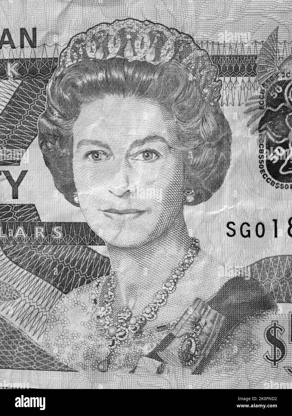 Queen Elizabeth's II Porträt über den Ostkaribischen Dollar des Commonwealth von Dominica. Stockfoto