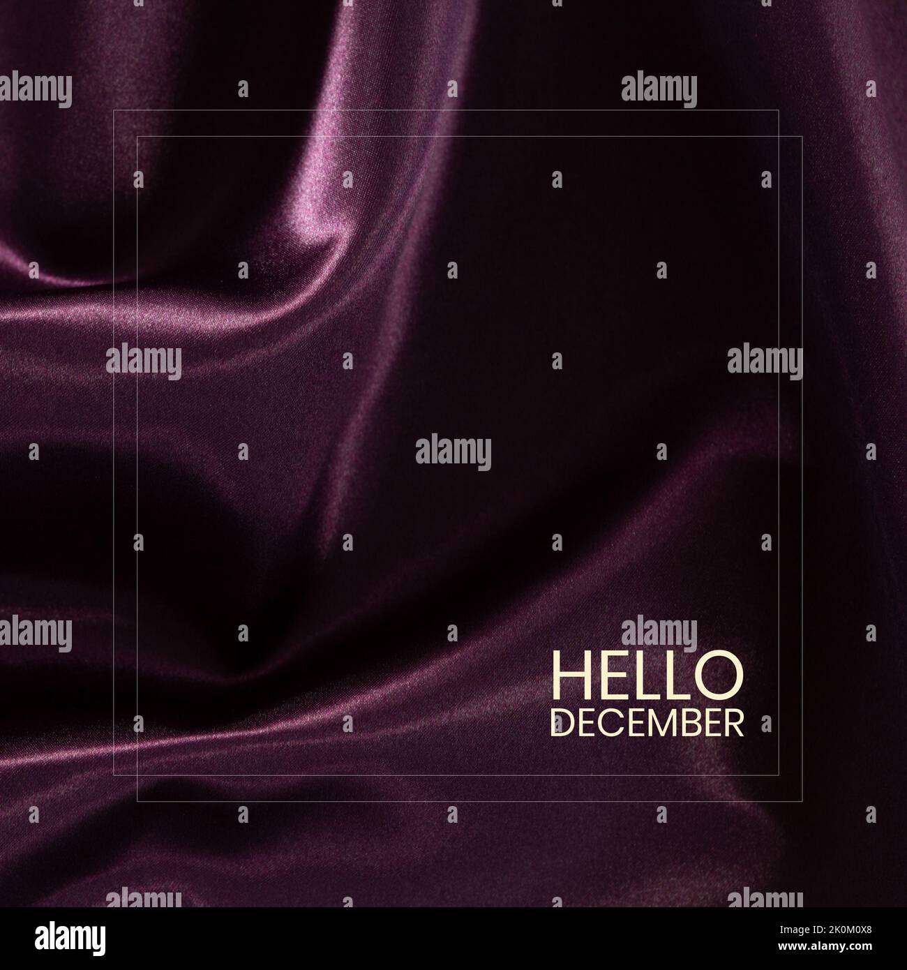 Komposition von Hello-dezember-Text auf Stoffhintergrund Stockfoto