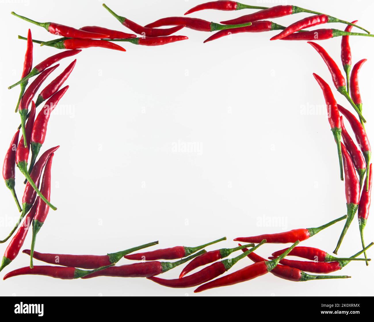 Rote Chili-Chilischoten Rahmen. Viel Platz für Text. Stockfoto