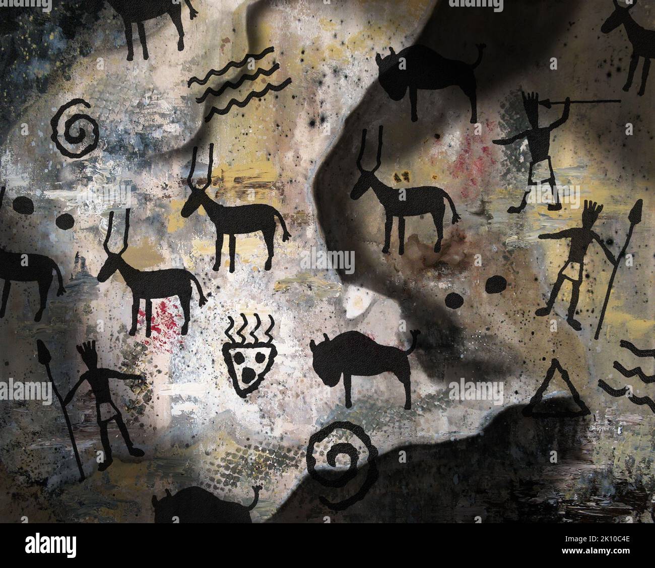 Prähistorische Tiere und Symbole schmücken die Innenwand einer Höhle. Stockfoto