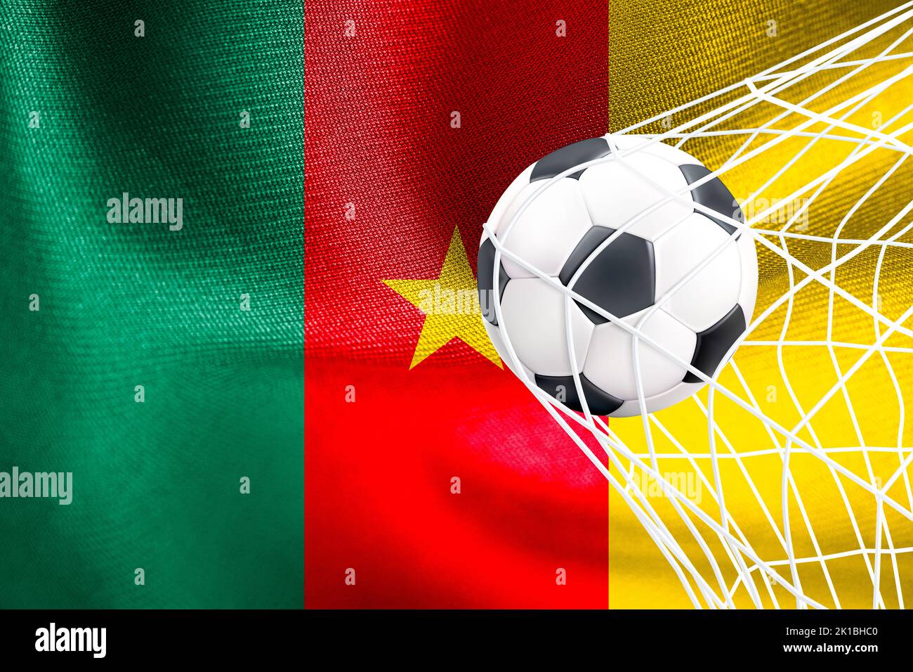 FIFAWeltmeisterschaft 2022, KamerunNationalflagge mit Fußball im Netz