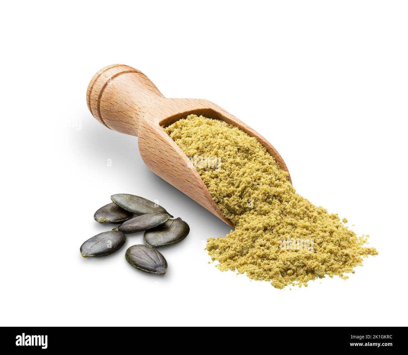 Kürbiskernmehl in einer Holzlöffel isoliert auf einem weißen Stockfoto