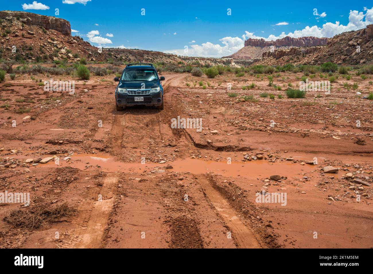 Schotterstraße beschädigt nach Sturzflut, Wolverine Loop Road, in der Nähe des Horse Canyon, Grand Staircase-Escalante National Monument, in der Nähe von Boulder, Utah, USA Stockfoto