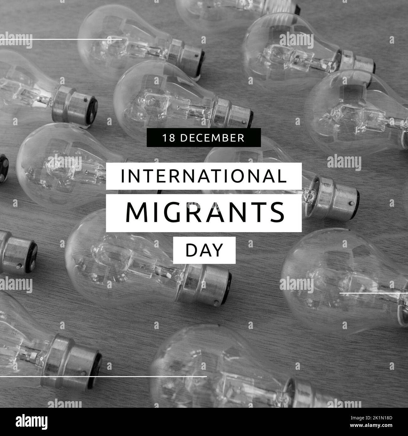Zusammensetzung des Tages internationaler Migranten Text über Schwarz-Weiß-Foto von Glühbirnen Stockfoto