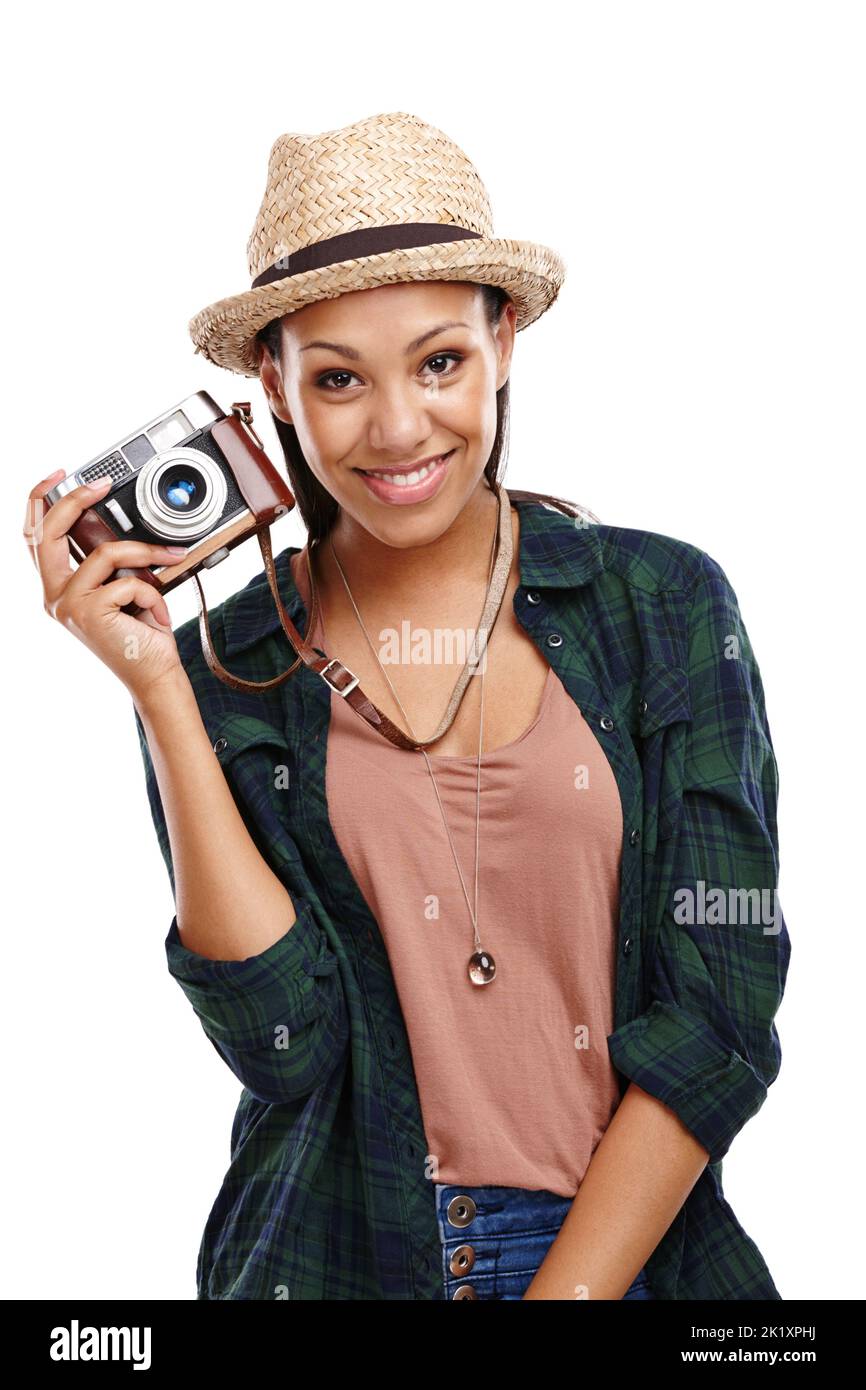 Film ist mein Favorit. Porträt einer attraktiven jungen Frau mit einer auf Weiß isolierten Retro-Kamera. Stockfoto Film ist mein Favorit. Porträt einer attraktiven jungen Frau mit einer auf Weiß isolierten Retro-Kamera. Stockfoto