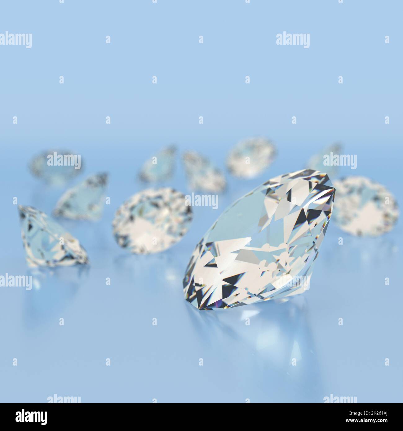 Glänzende weiße Diamanten auf blauem Hintergrund. Stockfoto