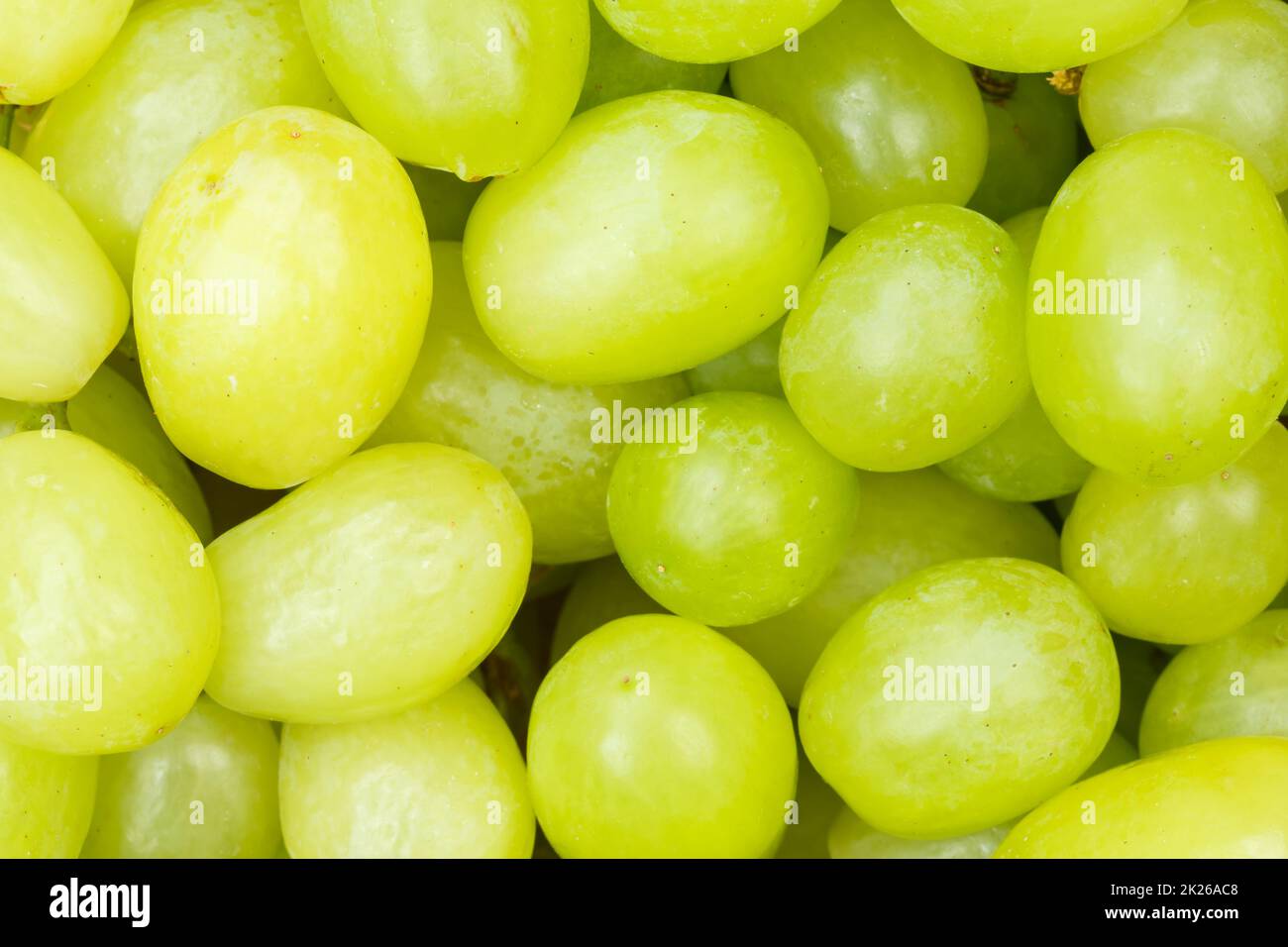 Grüne Weintrauben Trauben Früchte Obsthintergrund von oben Stockfoto