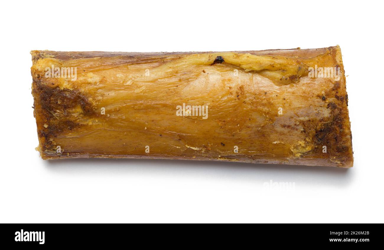 Cow Bone Dog Chew Draufsicht auf Weiß ausgeschnitten. Stockfoto