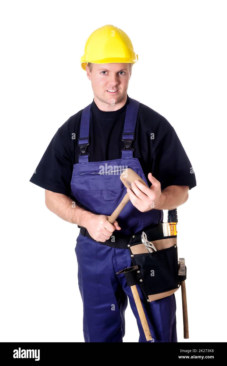 Porträt eines jungen Handwerkers, Arbeiter, Monteur vor weißem Hintergrund Stockfoto