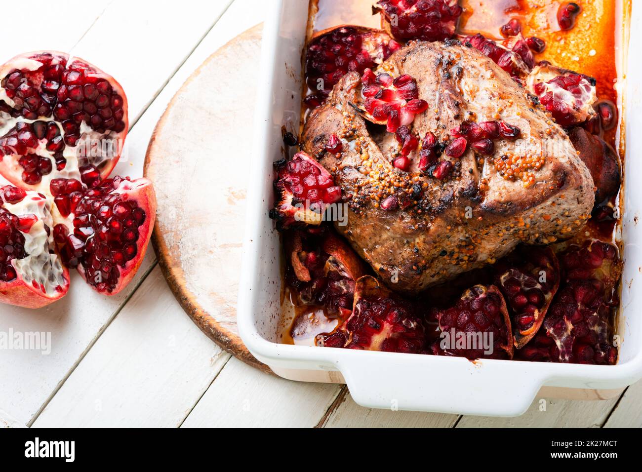 Schweinefleisch mit Granatäpfel Stockfoto