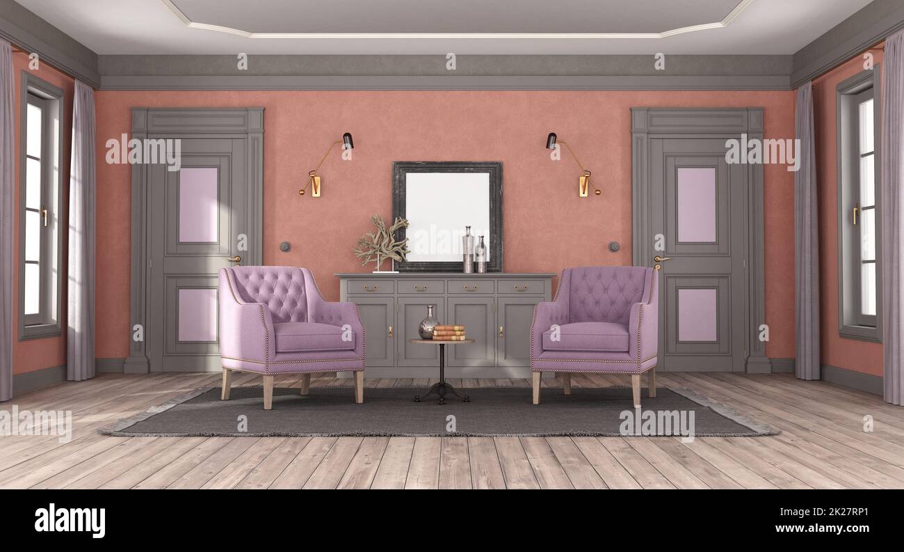 Wohnzimmer im klassischen Stil mit violettem Sessel Stockfoto