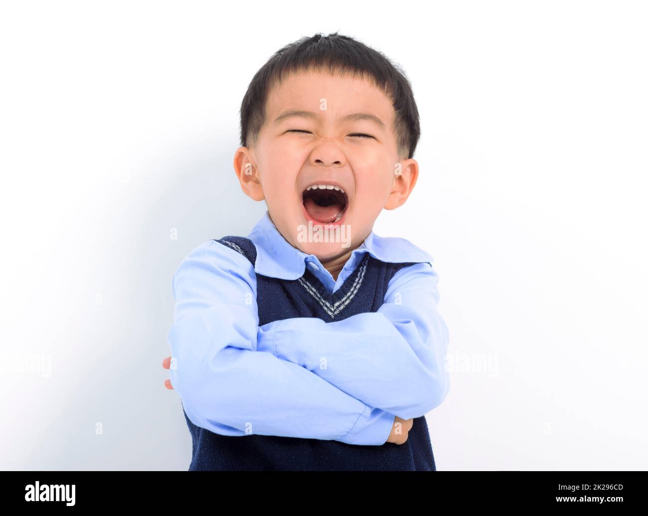 Happy Kid Junge mit Spaß auf weißem Hintergrund Stockfoto