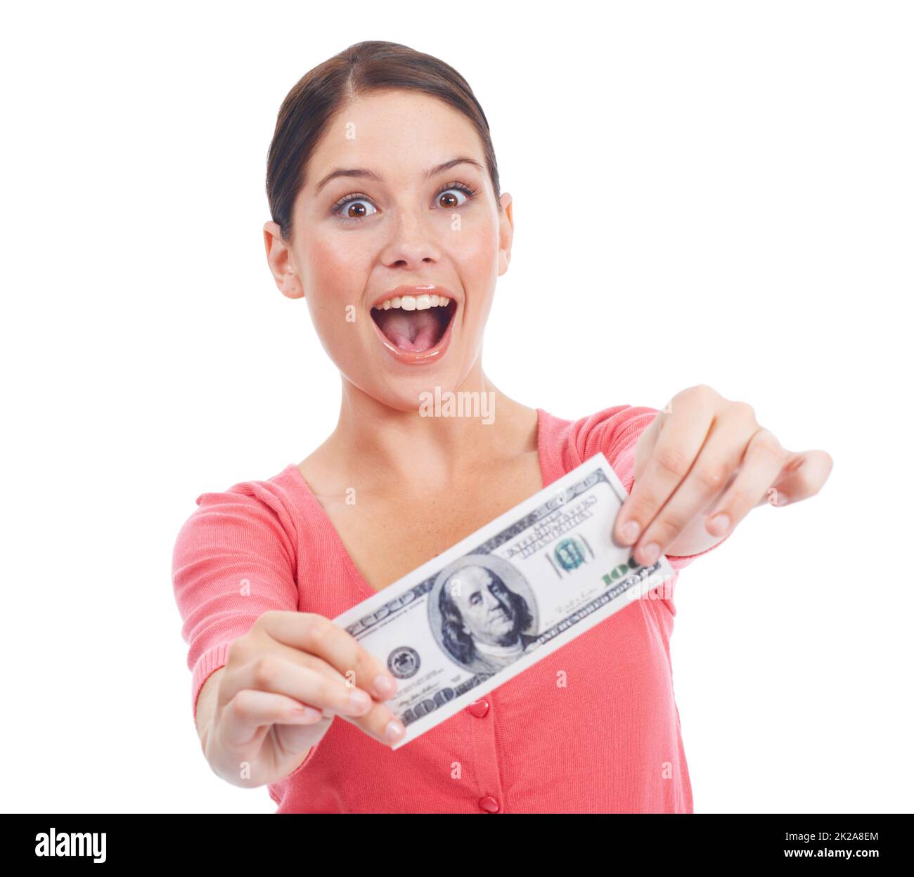 Gewinnen. Aufgeregte junge Frau, die Ihnen eine einzige Geldnote zeigt. Stockfoto
