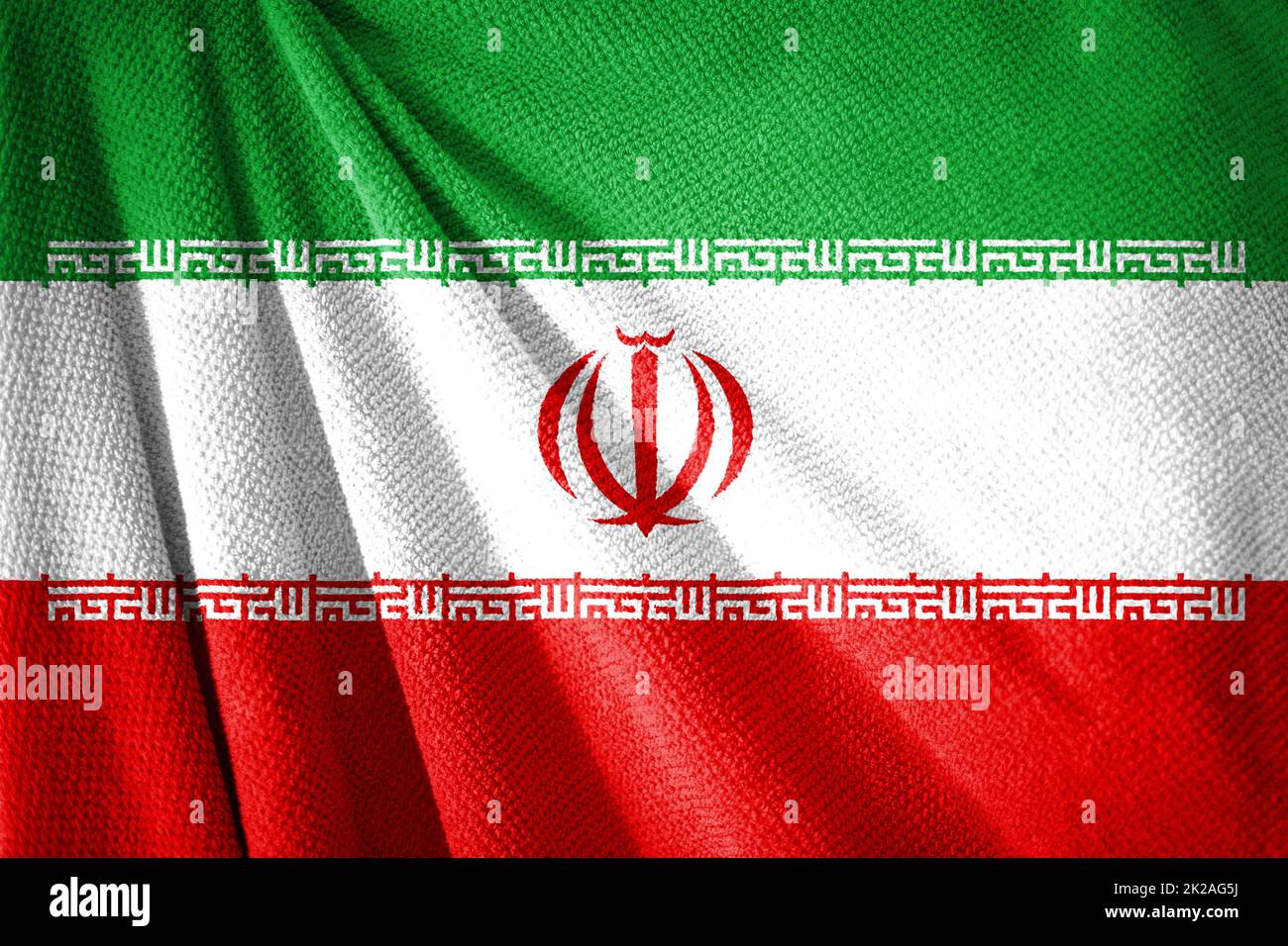 Iranflagge auf der Handtuchoberfläche mit Stockfoto