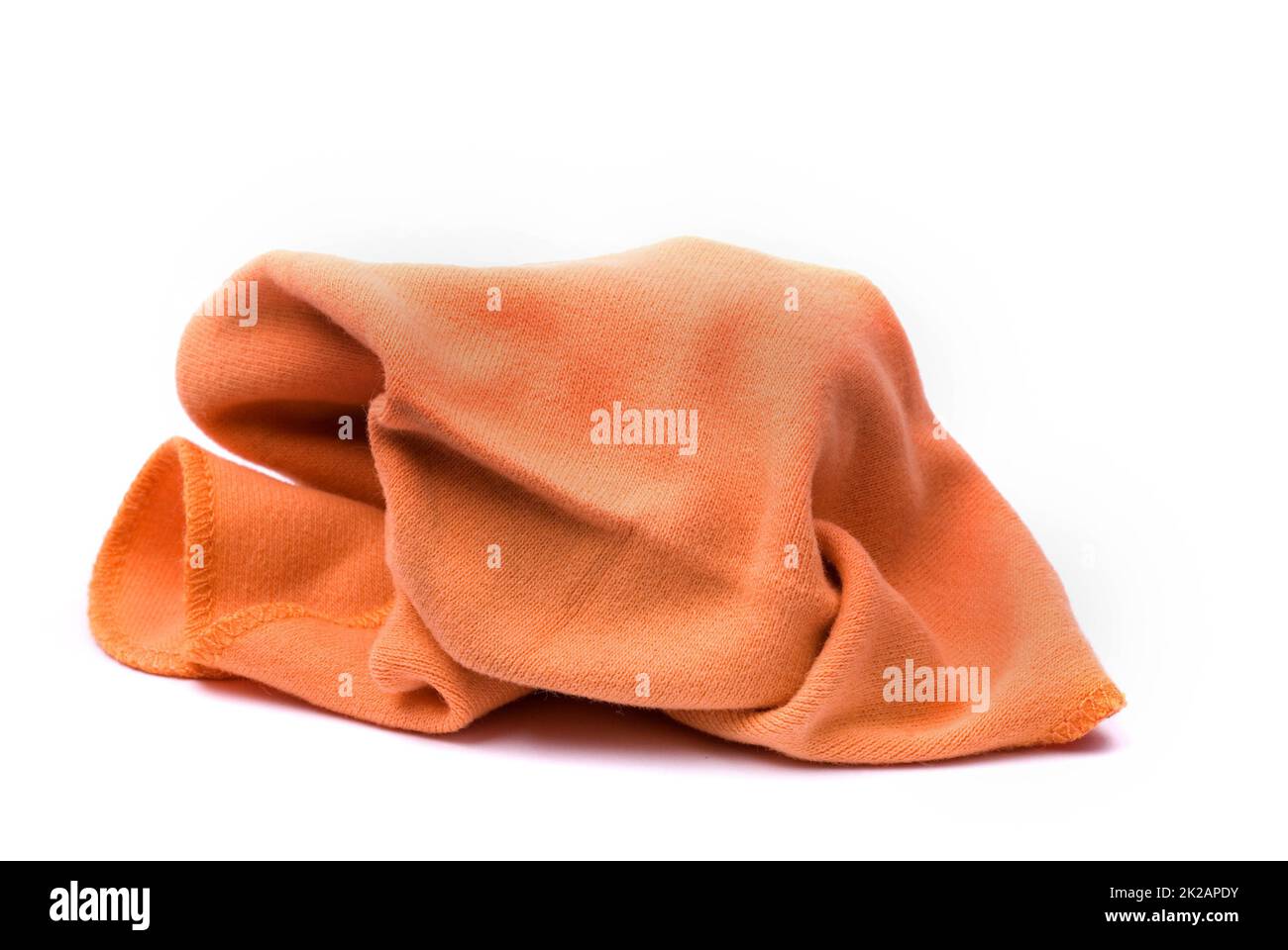Orangefarbener Staubwedel als Symbol für Sauberkeit und Ordnung Stockfoto