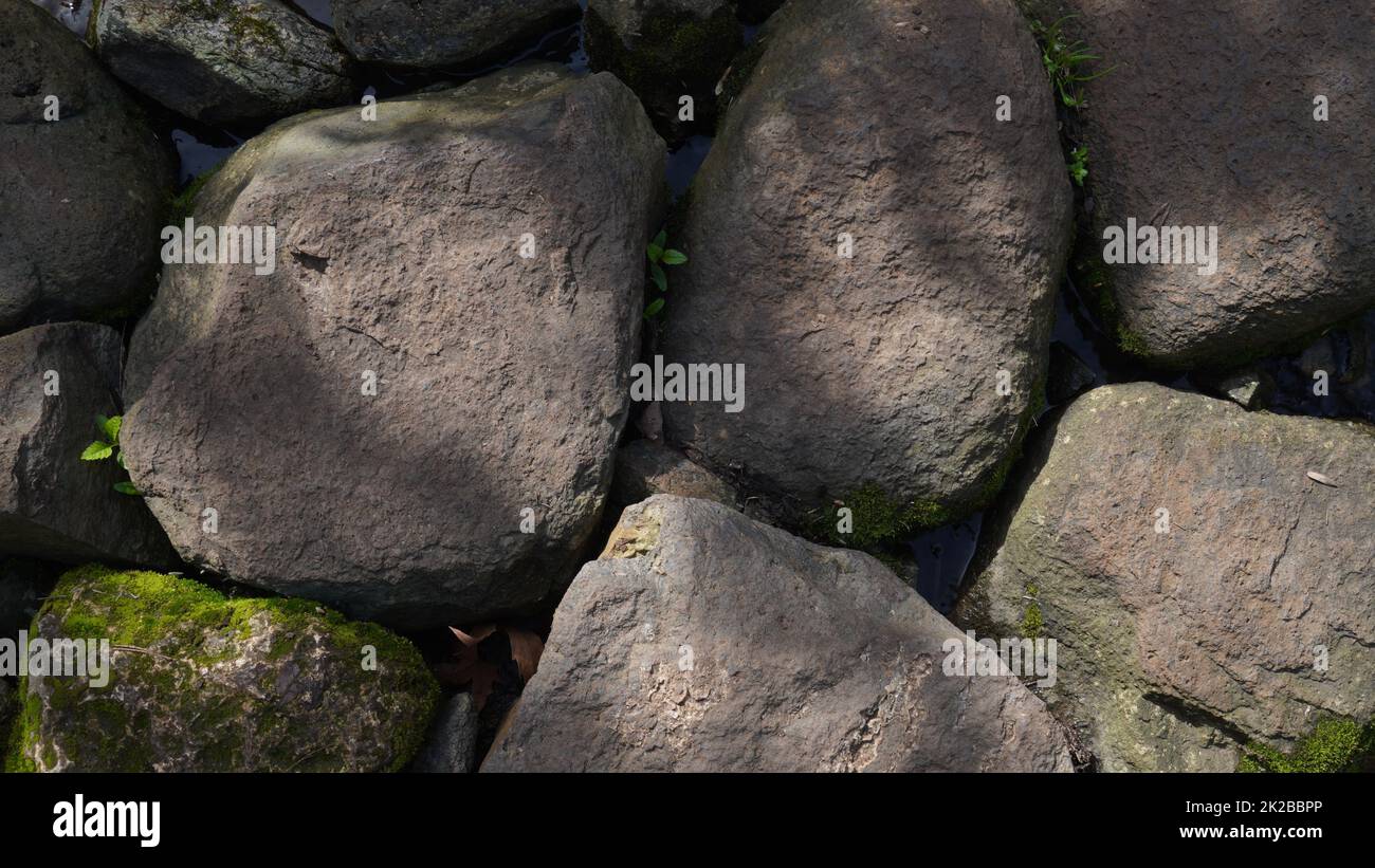 Textur einer Steinwand. Alte Burg Steinwand Hintergrund. Steinwand als Hintergrund oder Textur. Teil einer Steinwand, für Hintergrund oder Textur Stockfoto