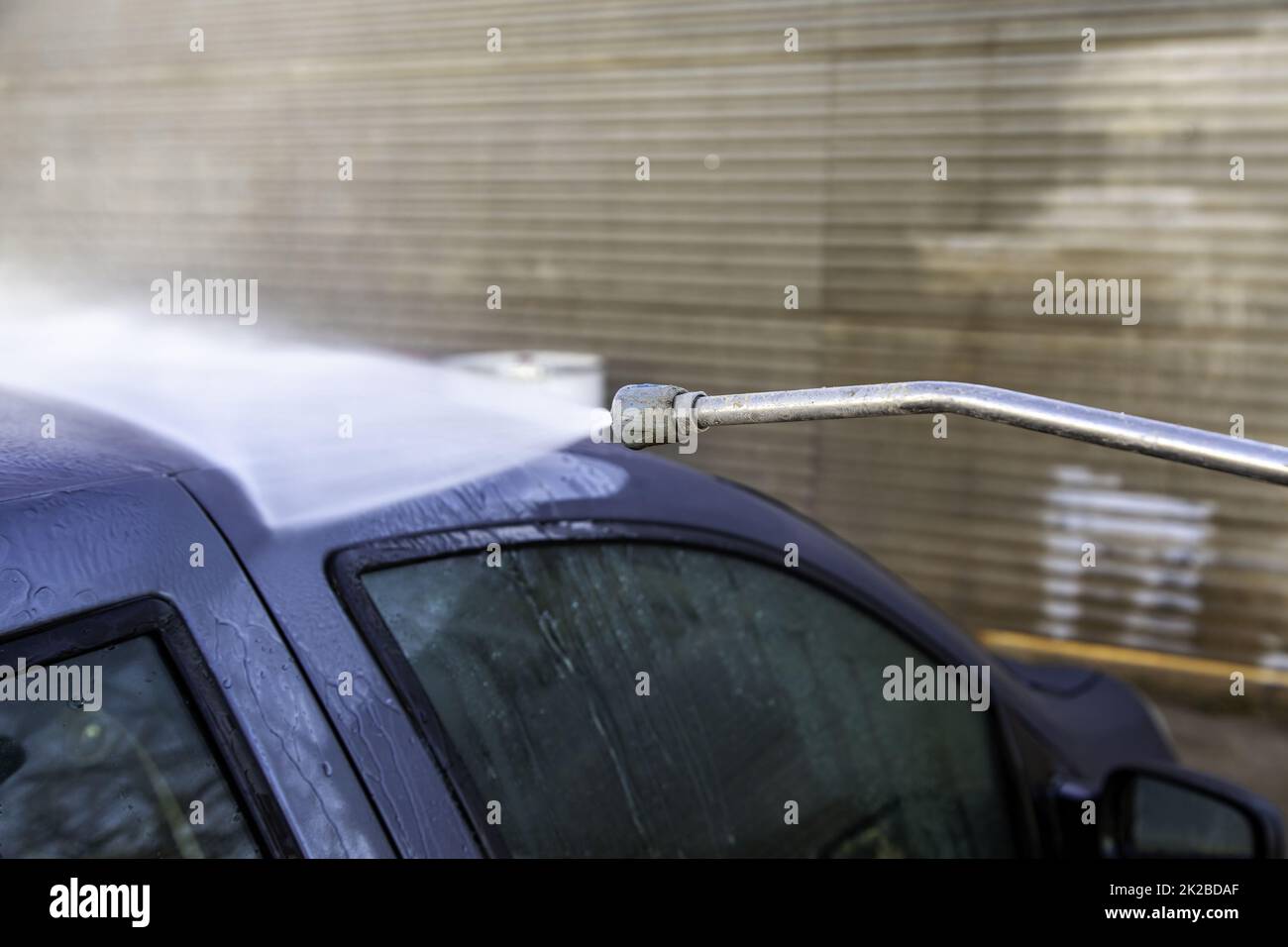 Autoschlauch waschen Stockfoto