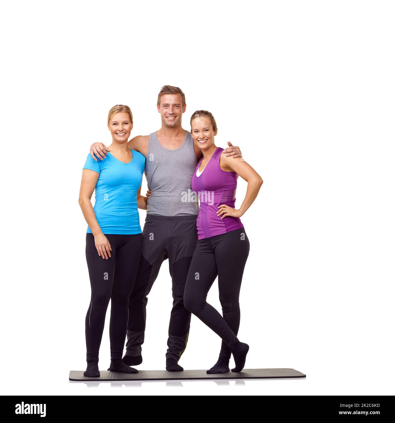 Partner in Fitness. Eine Gruppe von Fitness-Trainern auf weiß. Stockfoto