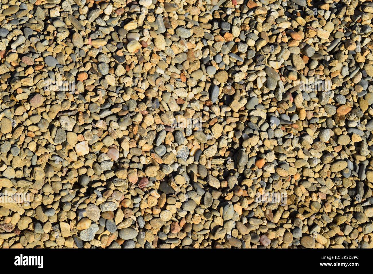 Von kleinen runden Schotter Hintergrund Stockfoto