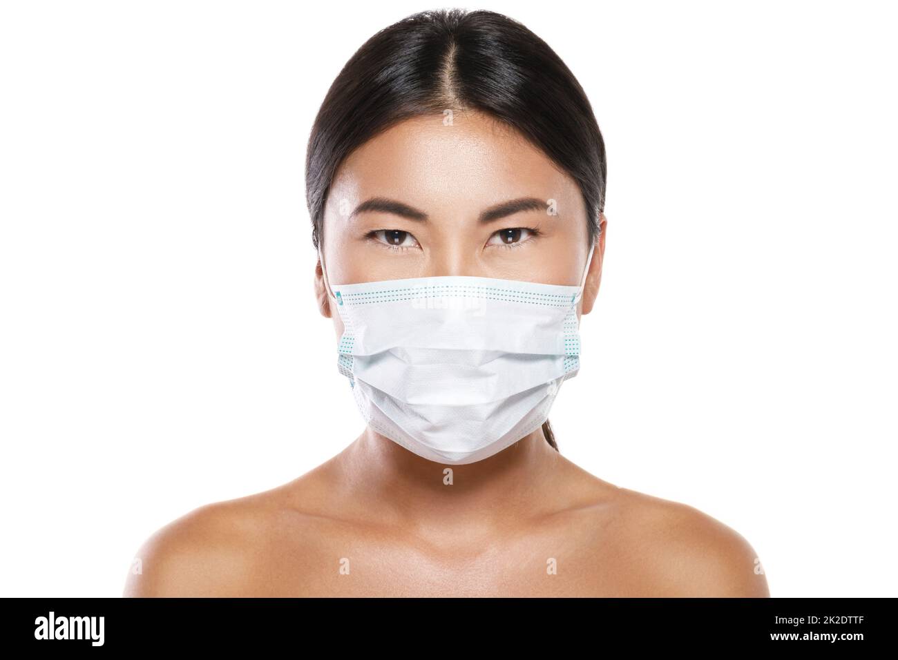 Asiatische Frau trägt Gesichtsmaske zum Schutz vor Luftverschmutzung oder Virus-Epidemie Stockfoto