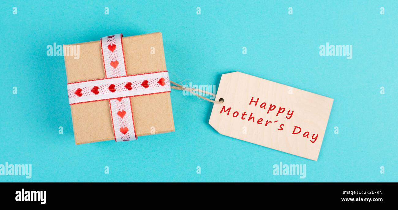 Kleine Geschenkbox mit Herzband, Grußkarte für motherÂ Tag Stockfoto