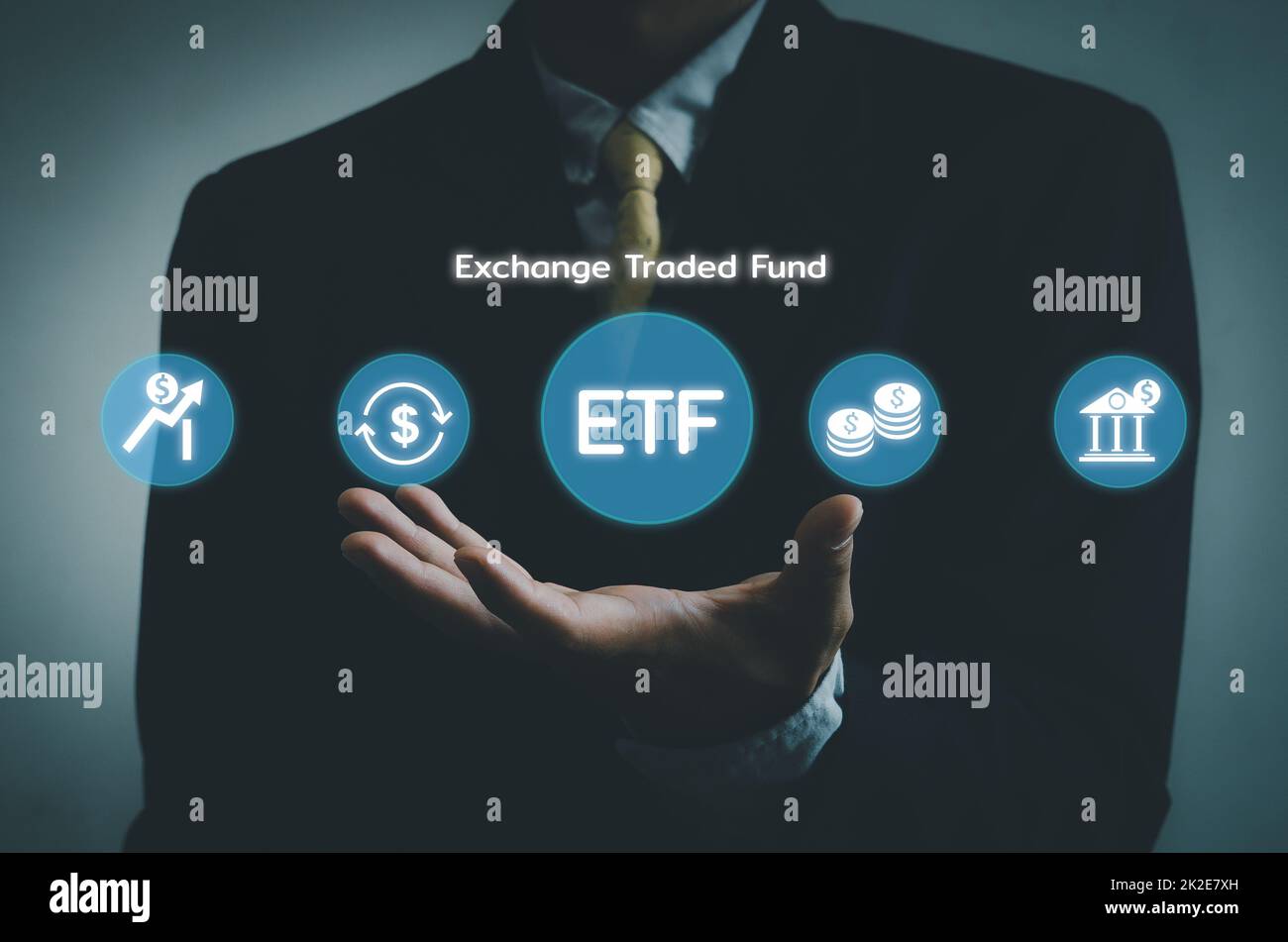 Hand Businessman Icon ETF Exchange Traded Fund Virtual Screen Internet Business Stock Market Finance Index Fund Concept. Stockfoto