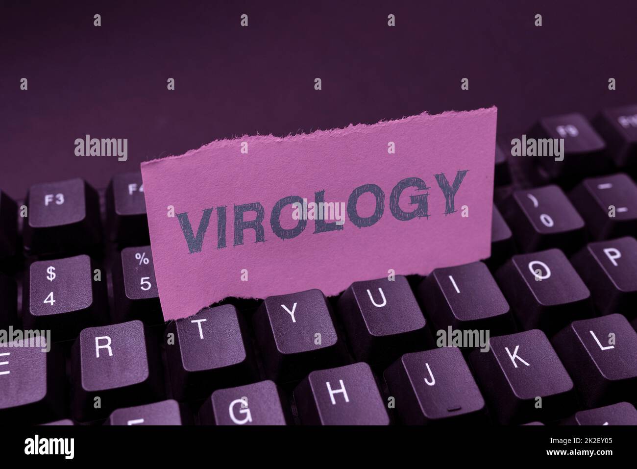 Schreiben mit Text Virologie. Geschäftsidee Virologie Abstraktes Tippen Lesson- und Lecture-Pläne, Neutippen von Liedtexen Stockfoto