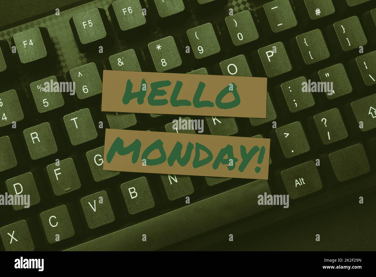 Schild mit der Aufschrift „Hello Monday“. Konzept bedeutet „Guten Morgen“ Begrüßung für den inspirierenden ersten Arbeitstag Eingeben wichtiger Informationen Online, Tippen lustiger Internet-Blog Stockfoto