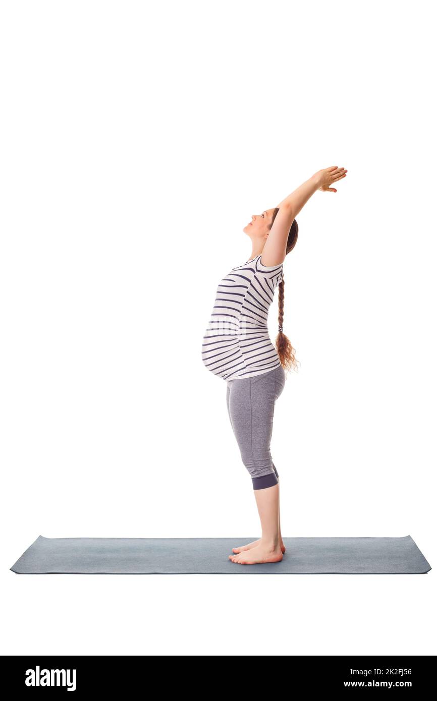 Schwanger Frau tun Yoga asana ... Stockfoto